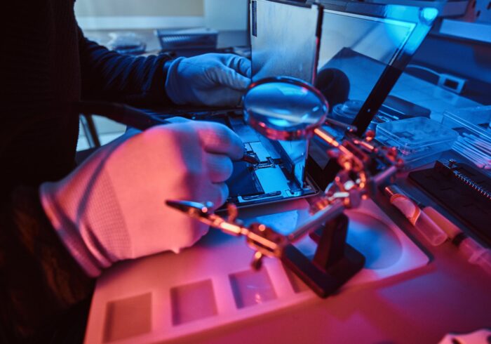 the-technician-repairs-a-broken-tablet-computer-in-2021-08-28-03-10-42-utc-min